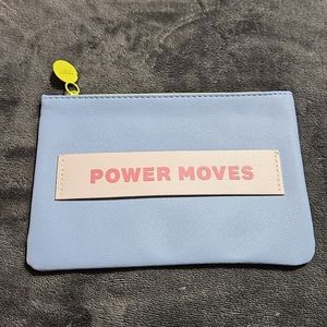 Empty Powder Blue Ipsy Cosmetics Bag with Power Moves on side